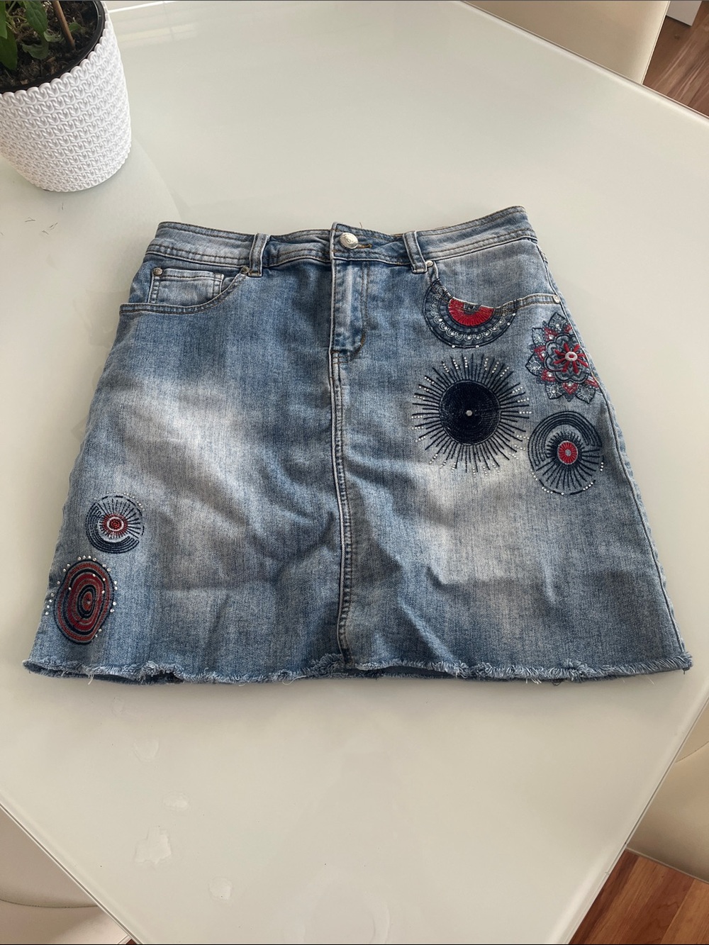 Blue Embroidered Denim Mini Skirt with Decorative Motifs